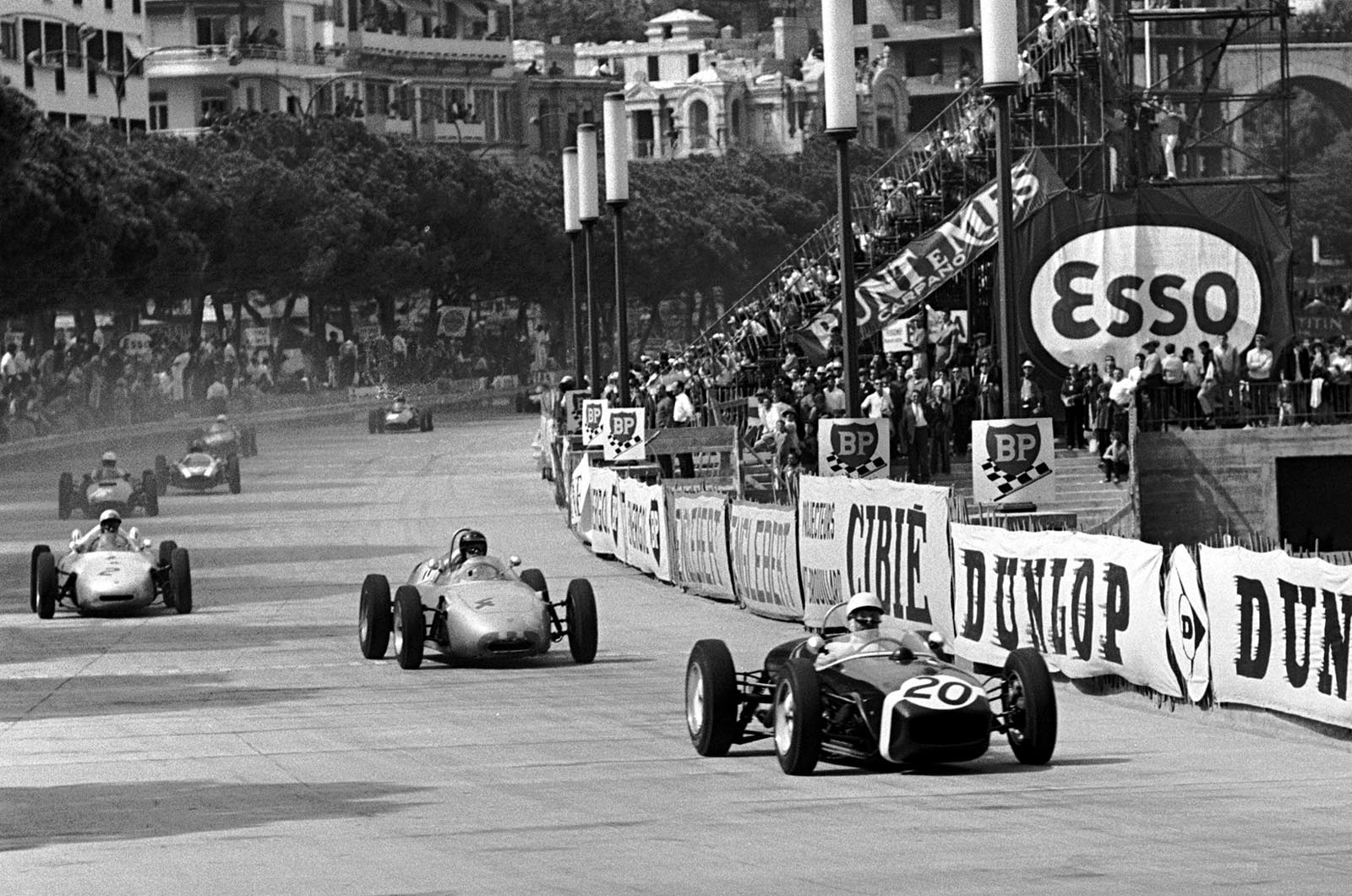 Moss (Rob Walker Lotus 18) leads fifth-place finisher Gurney (Porsche 718) in Monte Carlo