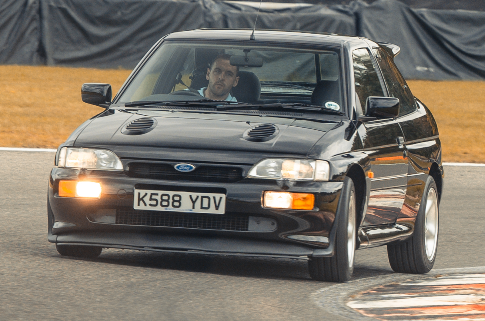 Classic & Sports Car - Black & Blue: Ford Escort RS Cosworth vs Subaru Impreza P1