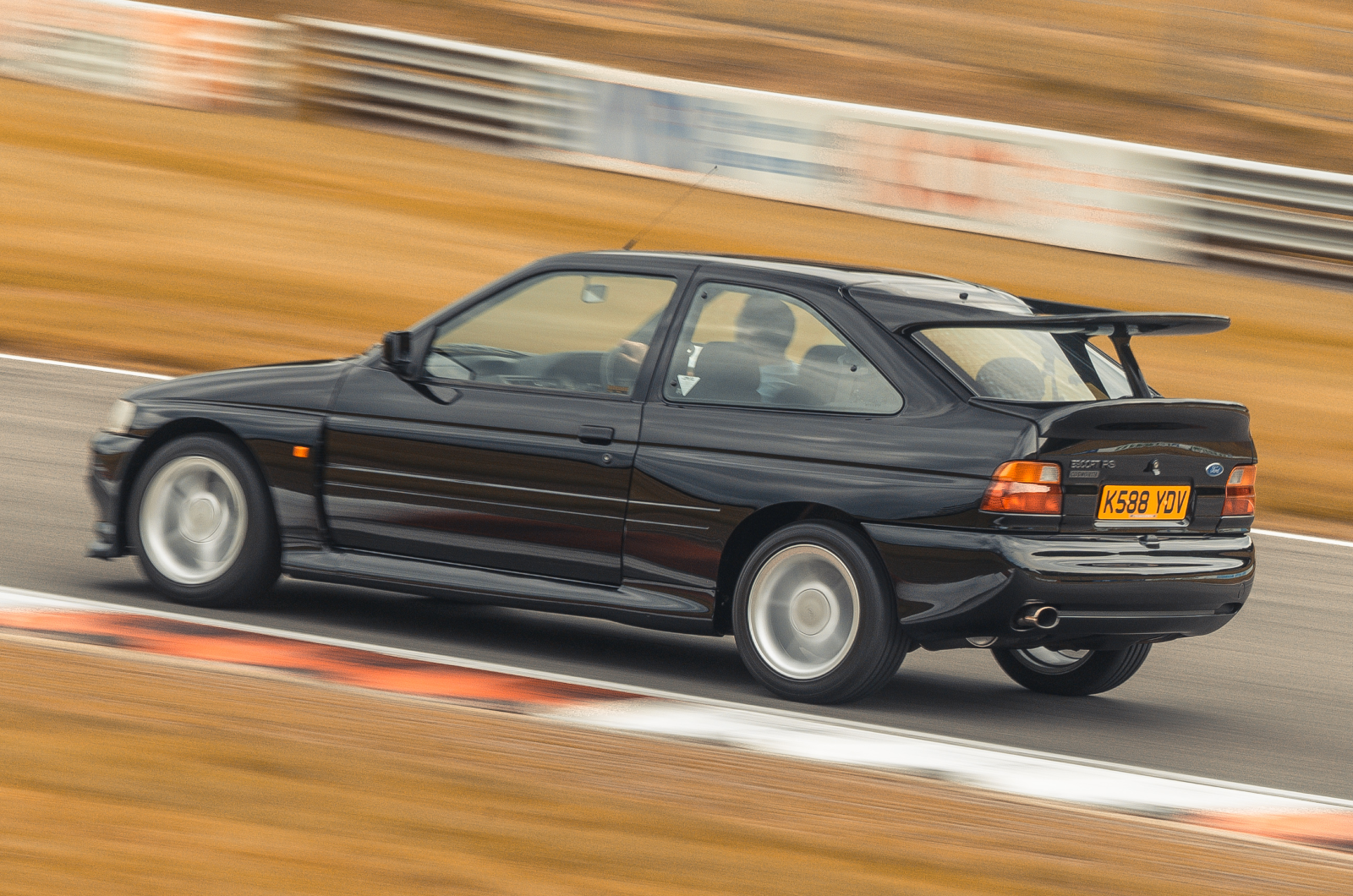 Classic & Sports Car - Black & Blue: Ford Escort RS Cosworth vs Subaru Impreza P1