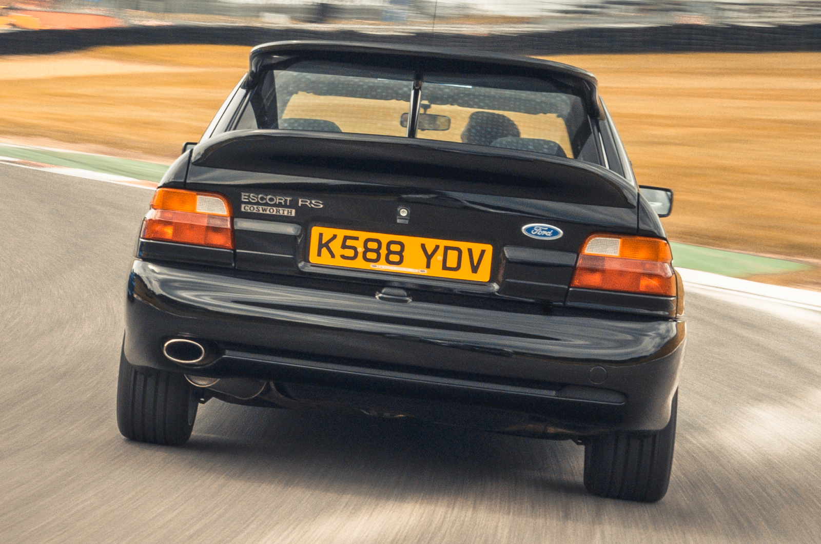 Classic & Sports Car - Black & Blue: Ford Escort RS Cosworth vs Subaru Impreza P1