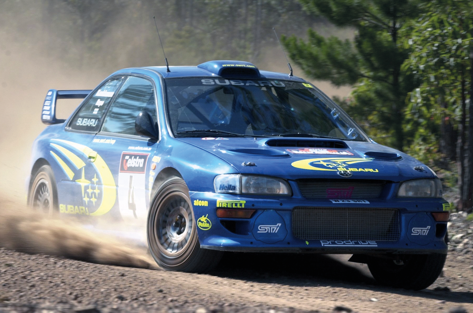 Classic & Sports Car - Black & Blue: Ford Escort RS Cosworth vs Subaru Impreza P1