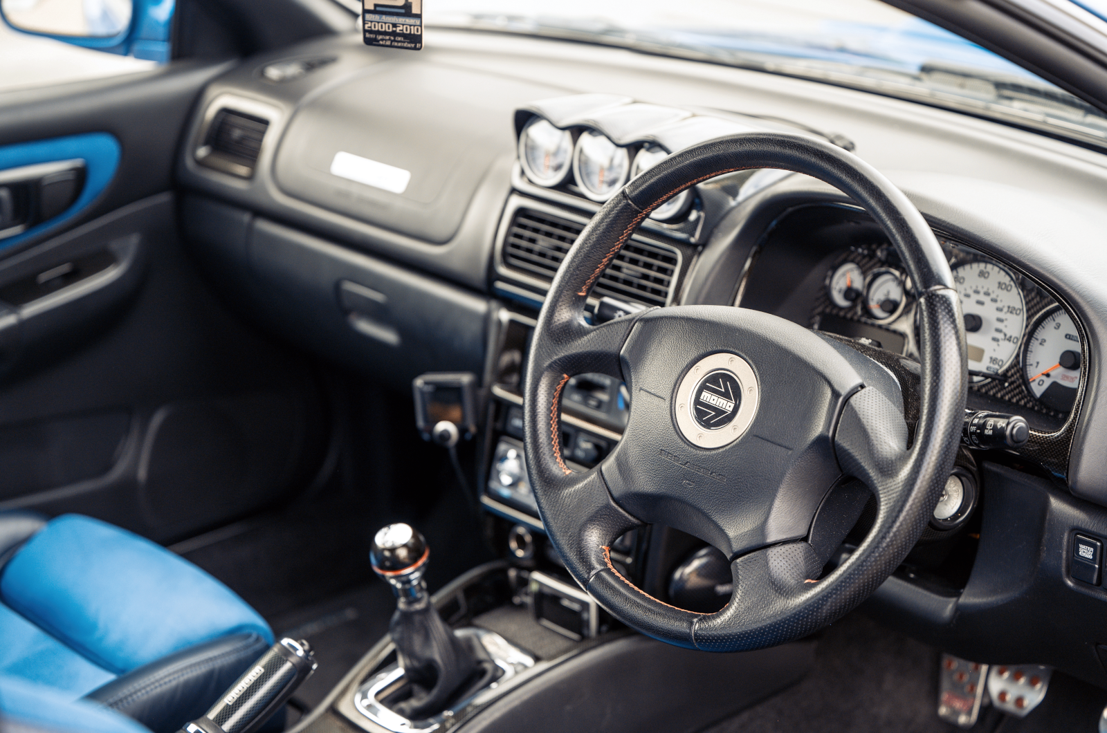 Classic & Sports Car - Black & Blue: Ford Escort RS Cosworth vs Subaru Impreza P1