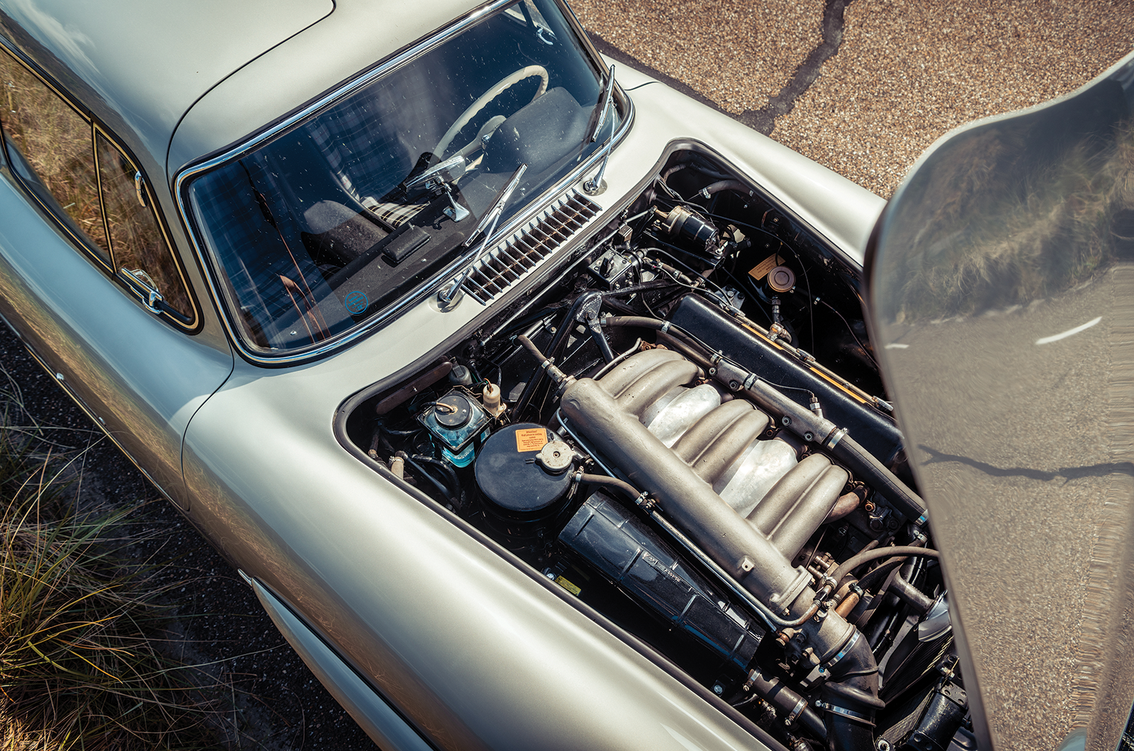 Classic & Sports Car – Aston Martin DB5 vs Mercedes-Benz 300SL vs Ferrari 275GTB: million dollar babies