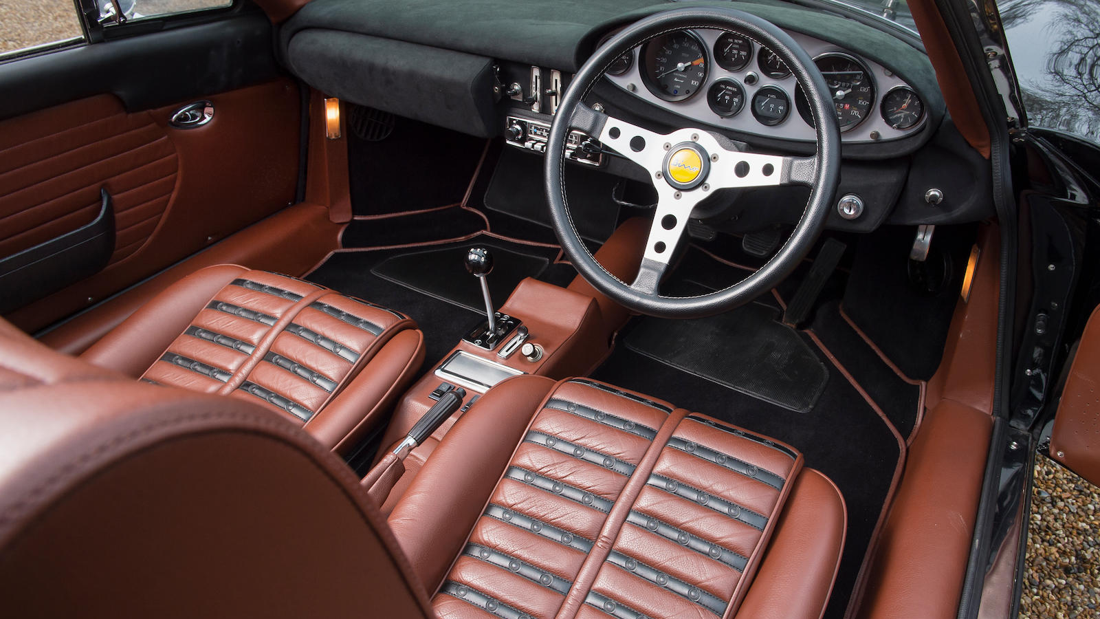 Rock legends' supercars up for auction