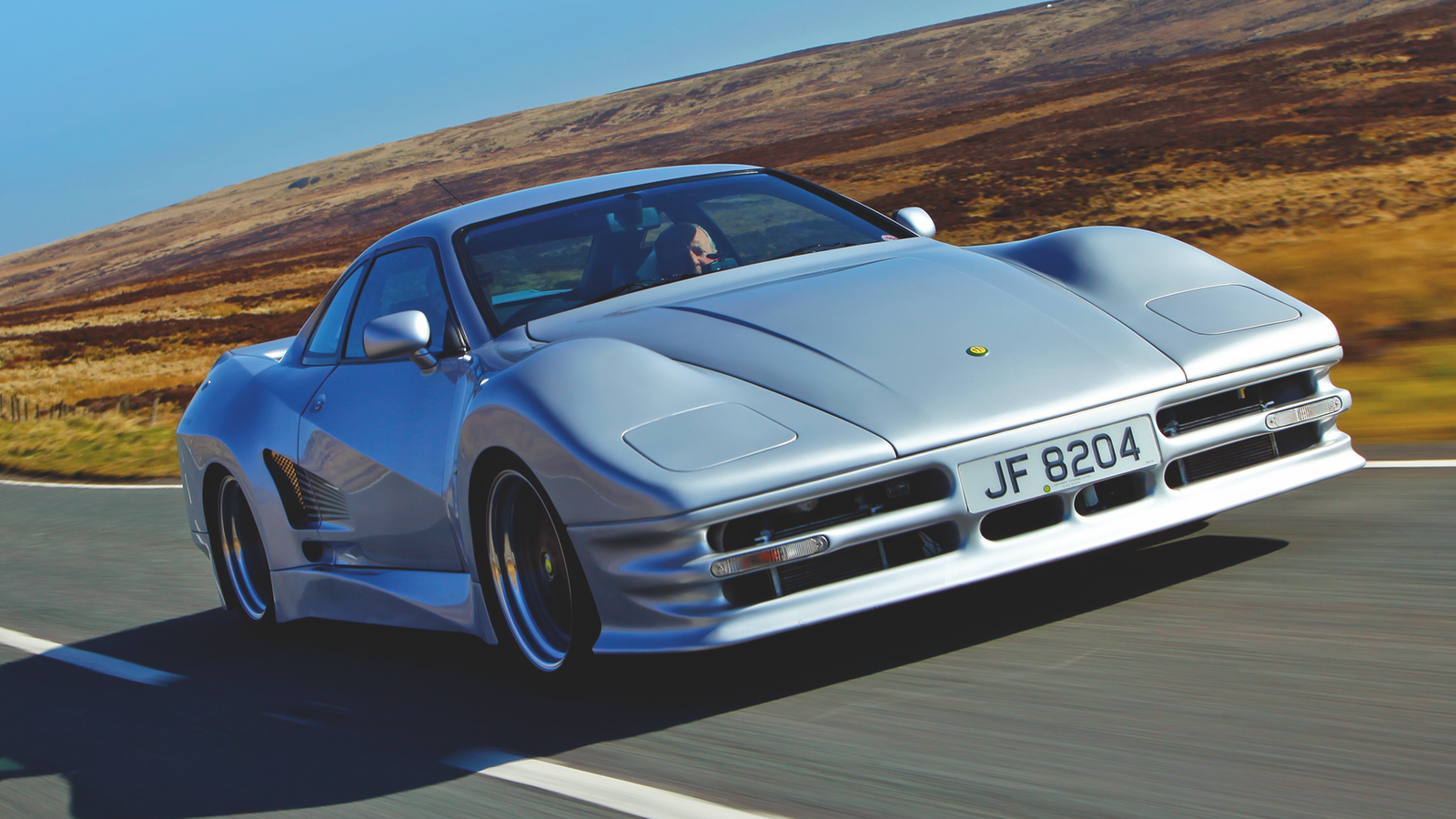 Behind the wheel of Lister's Ferrari-beater