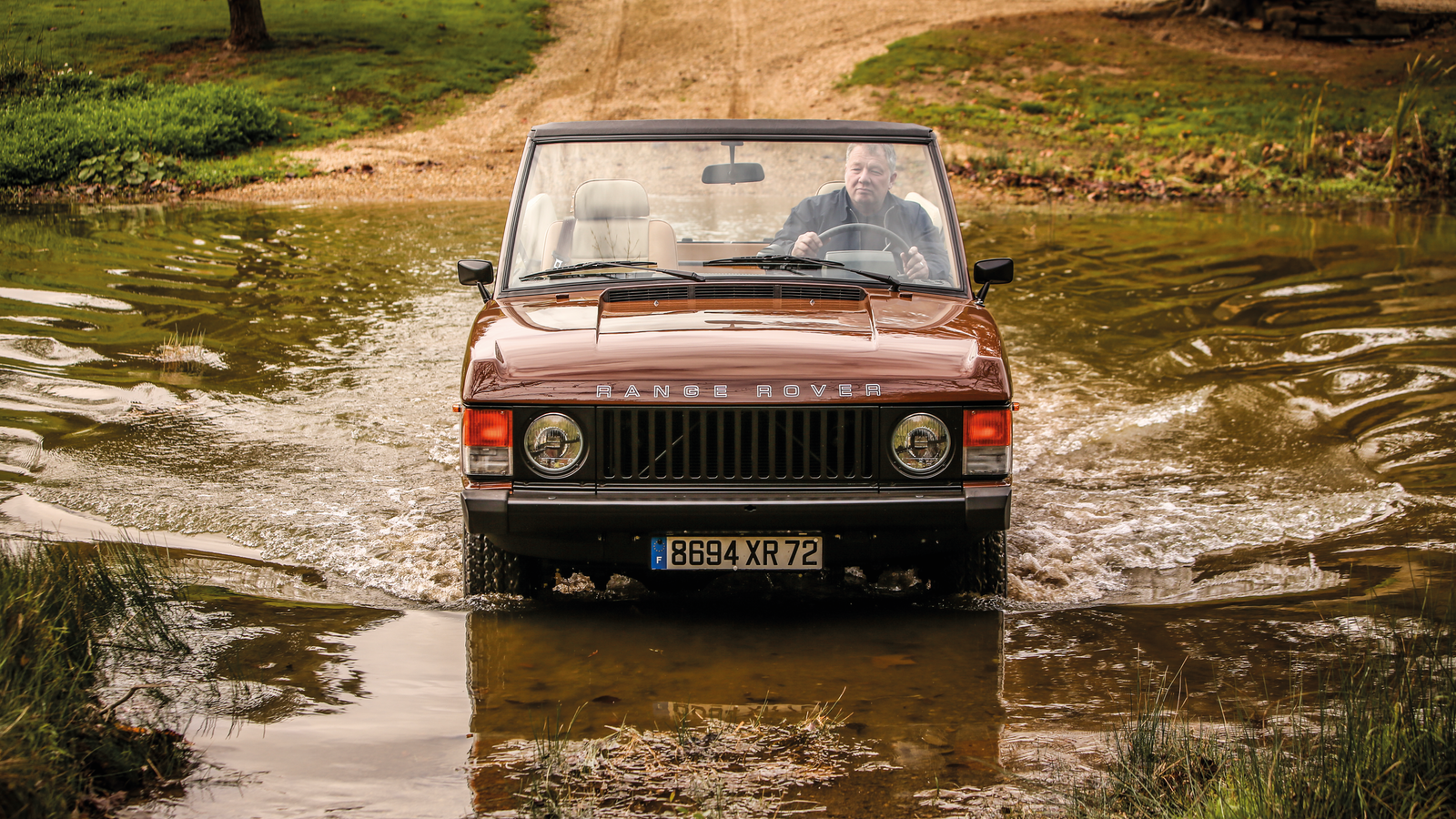 This custom roofless Range Rover was inspired by Bond