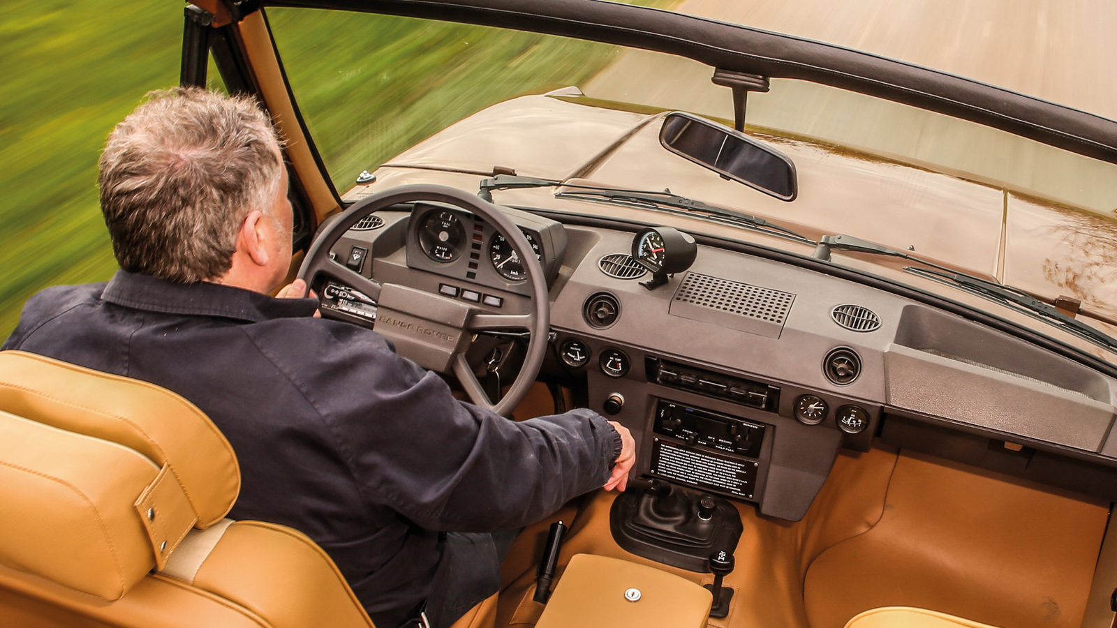 This custom roofless Range Rover was inspired by Bond