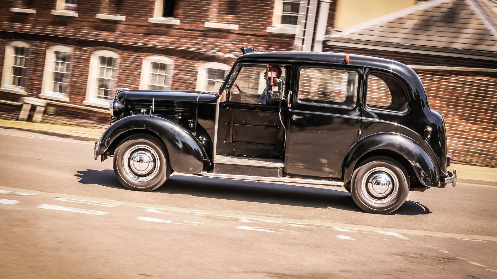 Taking a ride in the original black cab