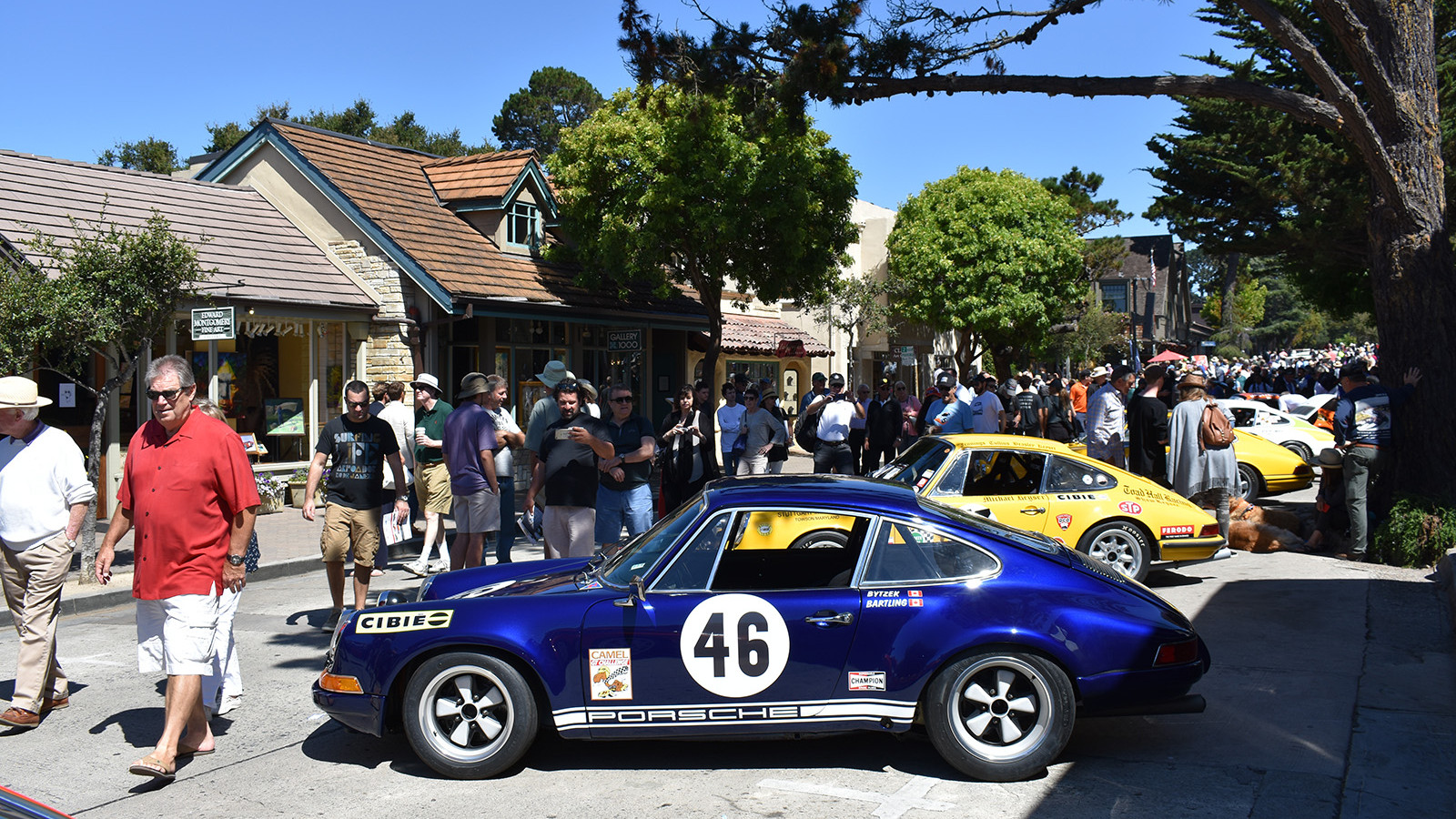 A pack of Porsche racers