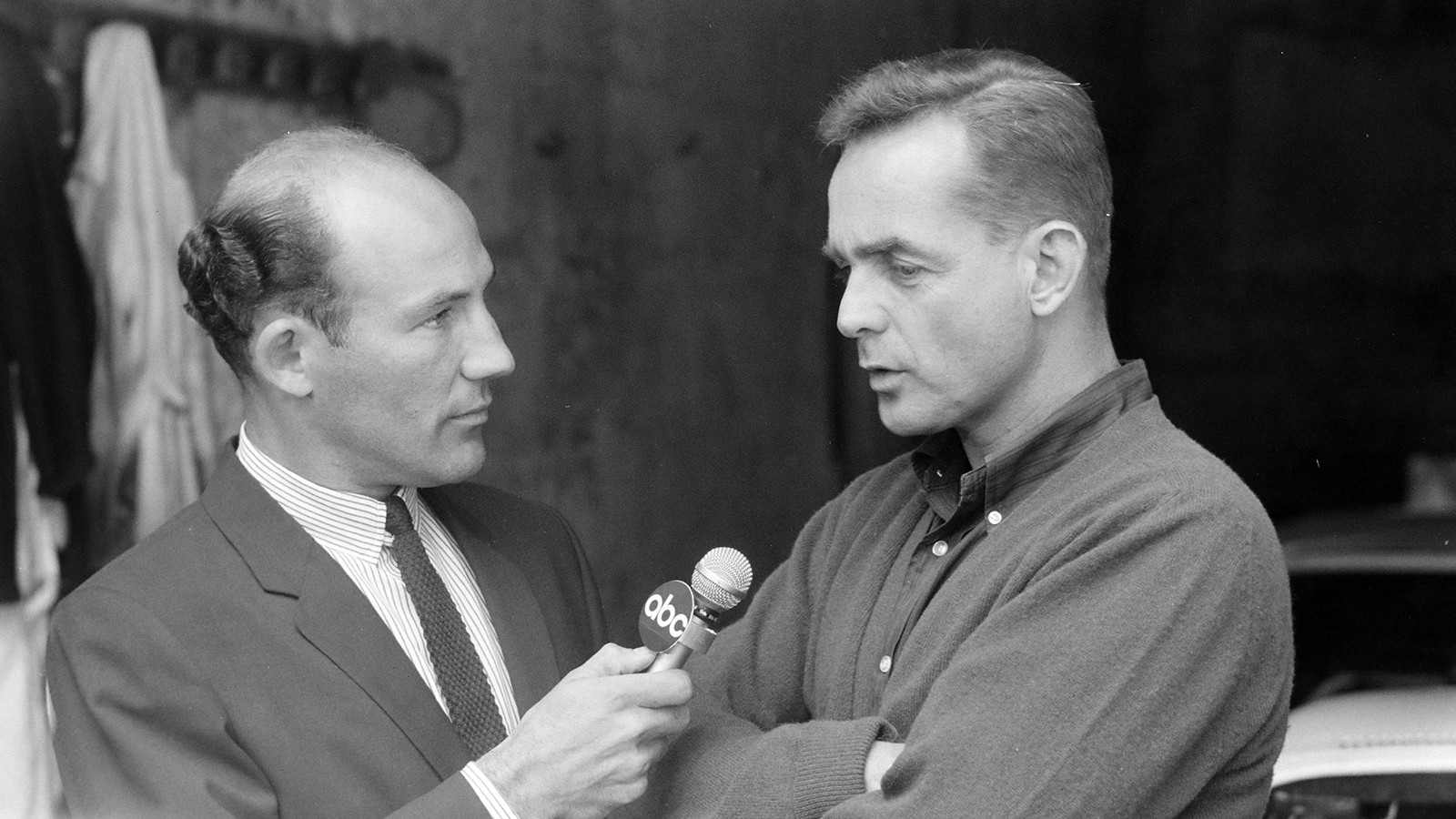 In front of the camera