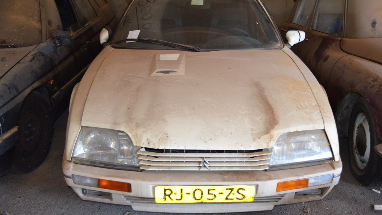 This is what 148 Citroën CXs in a barn looks like