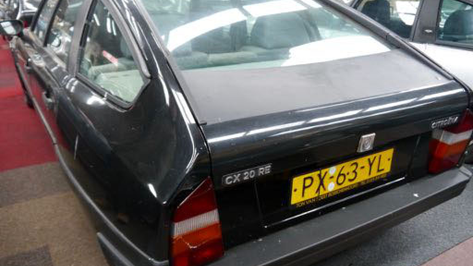 This is what 148 Citroën CXs in a barn looks like